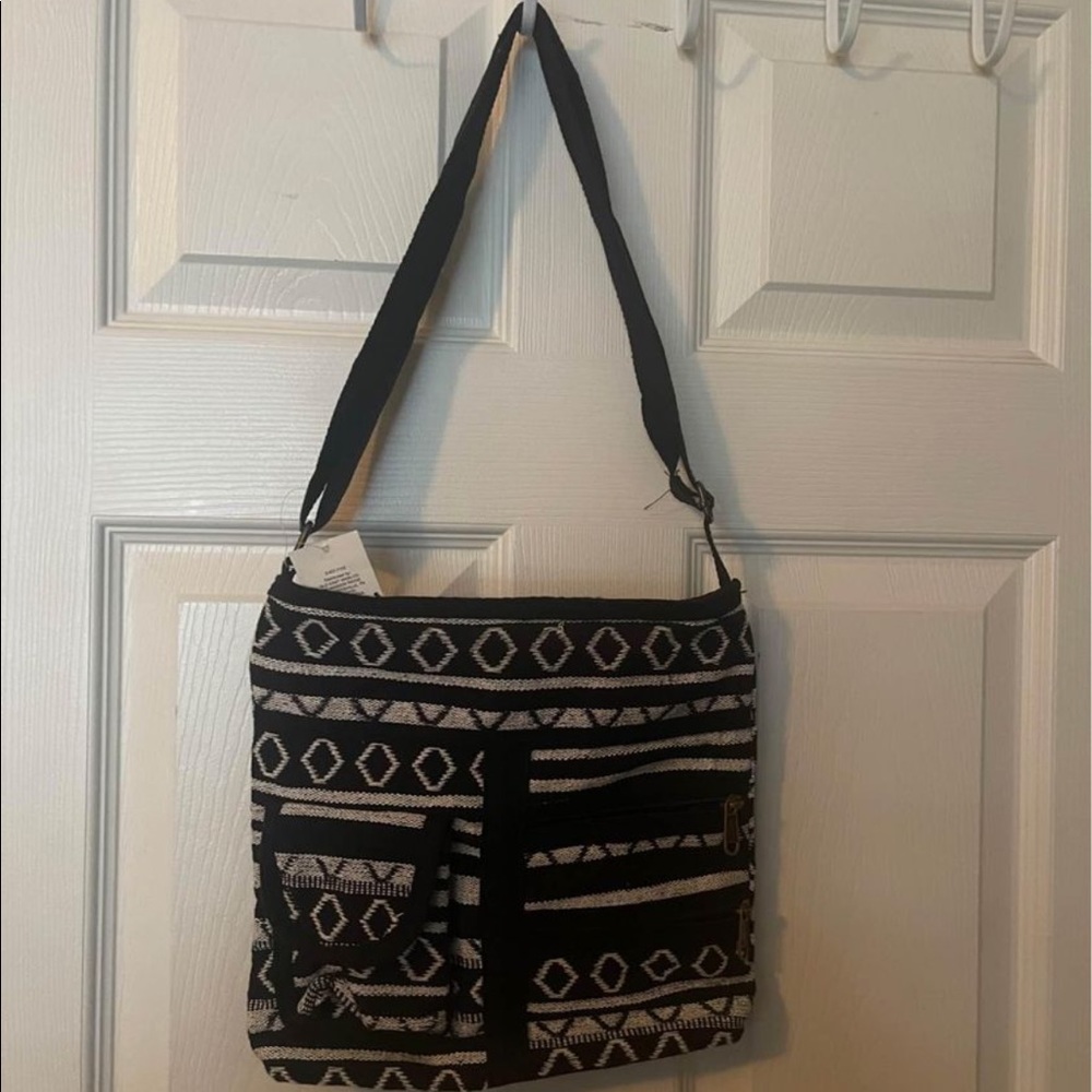 NWT canvas and cloth Aztec crossbody bag.